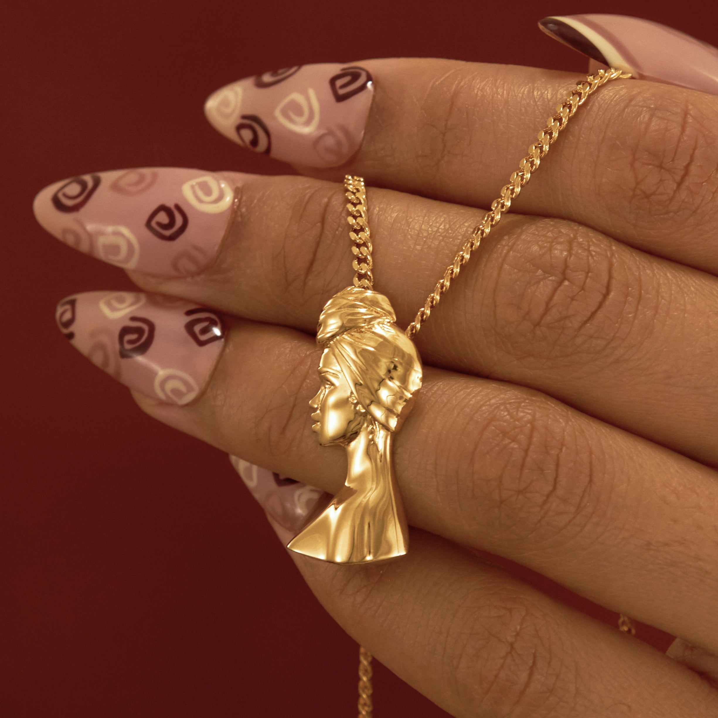 Gold Plated Headwrap Pendant Necklace with Afro Pick from NUJUAL, a black owned jewelry shop for men and women.