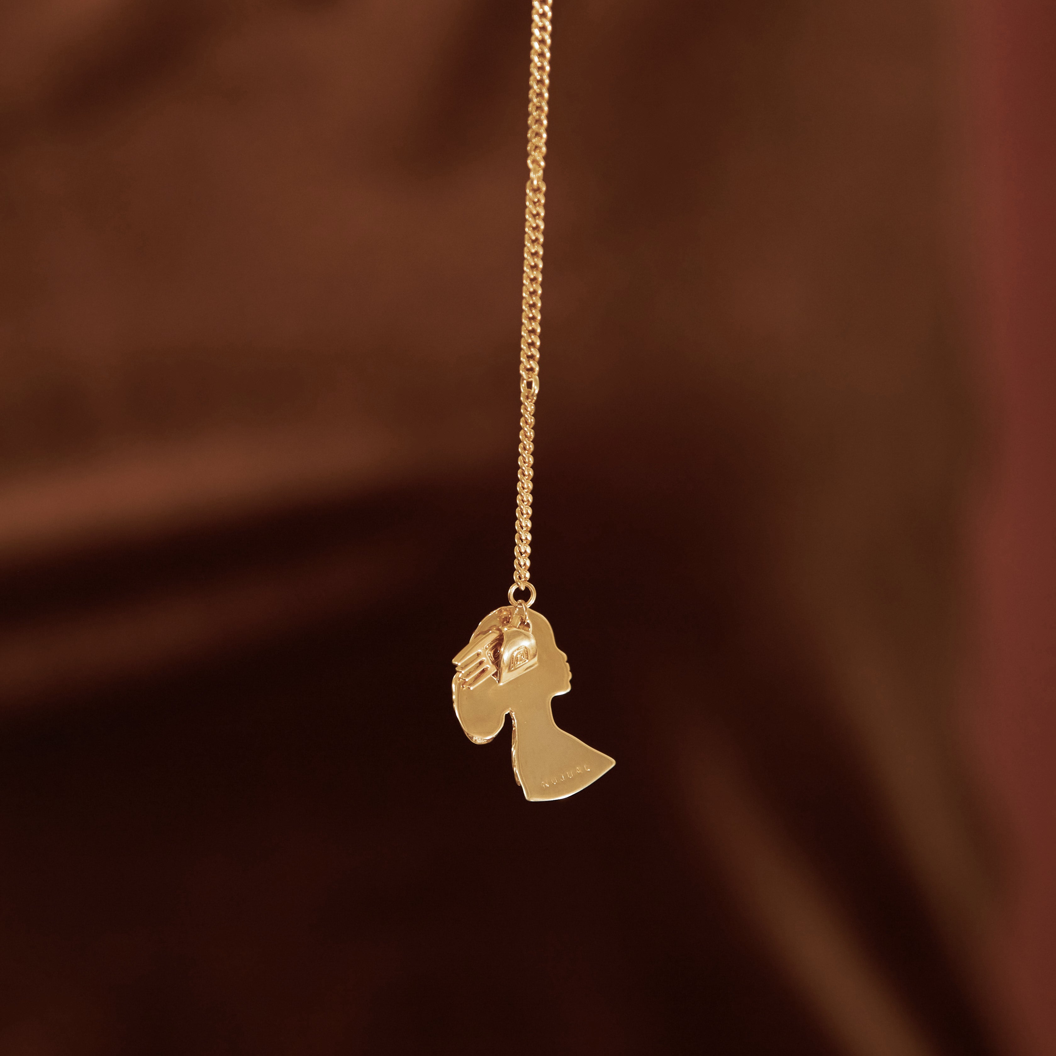 Gold Plated Dreadlocks Pendant Necklace with Afro Pick from NUJUAL, a black owned jewelry shop for men and women.