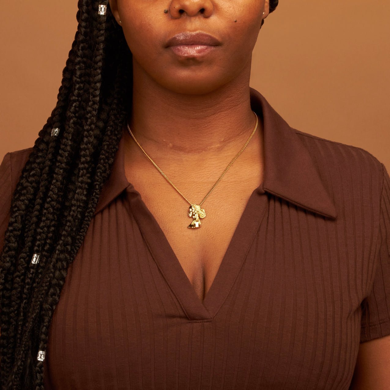 Gold Plated Dreadlocks Pendant Necklace with Afro Pick from NUJUAL, a black owned jewelry shop for men and women.