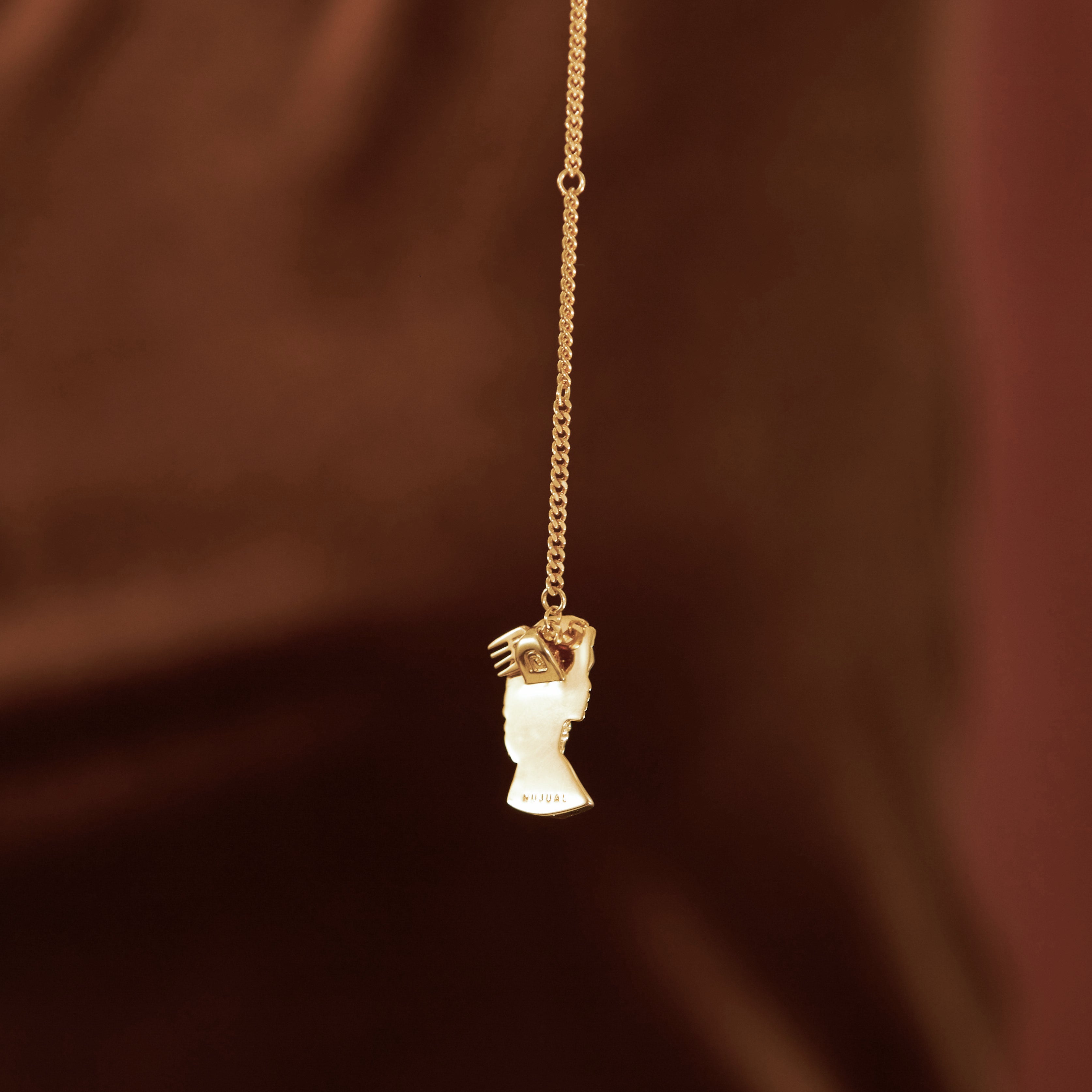 Gold Plated Curly Hair Pendant Necklace with Afro Pick from NUJUAL, a black owned jewelry shop for men and women.