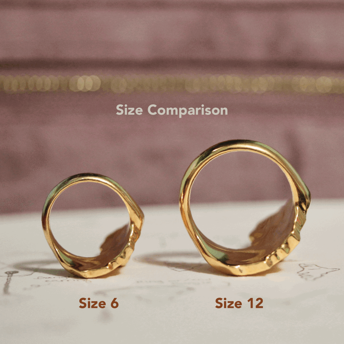 Gold Plated Africa Face Motherland Statement Ring from NUJUAL, a black owned jewelry shop for men and women.