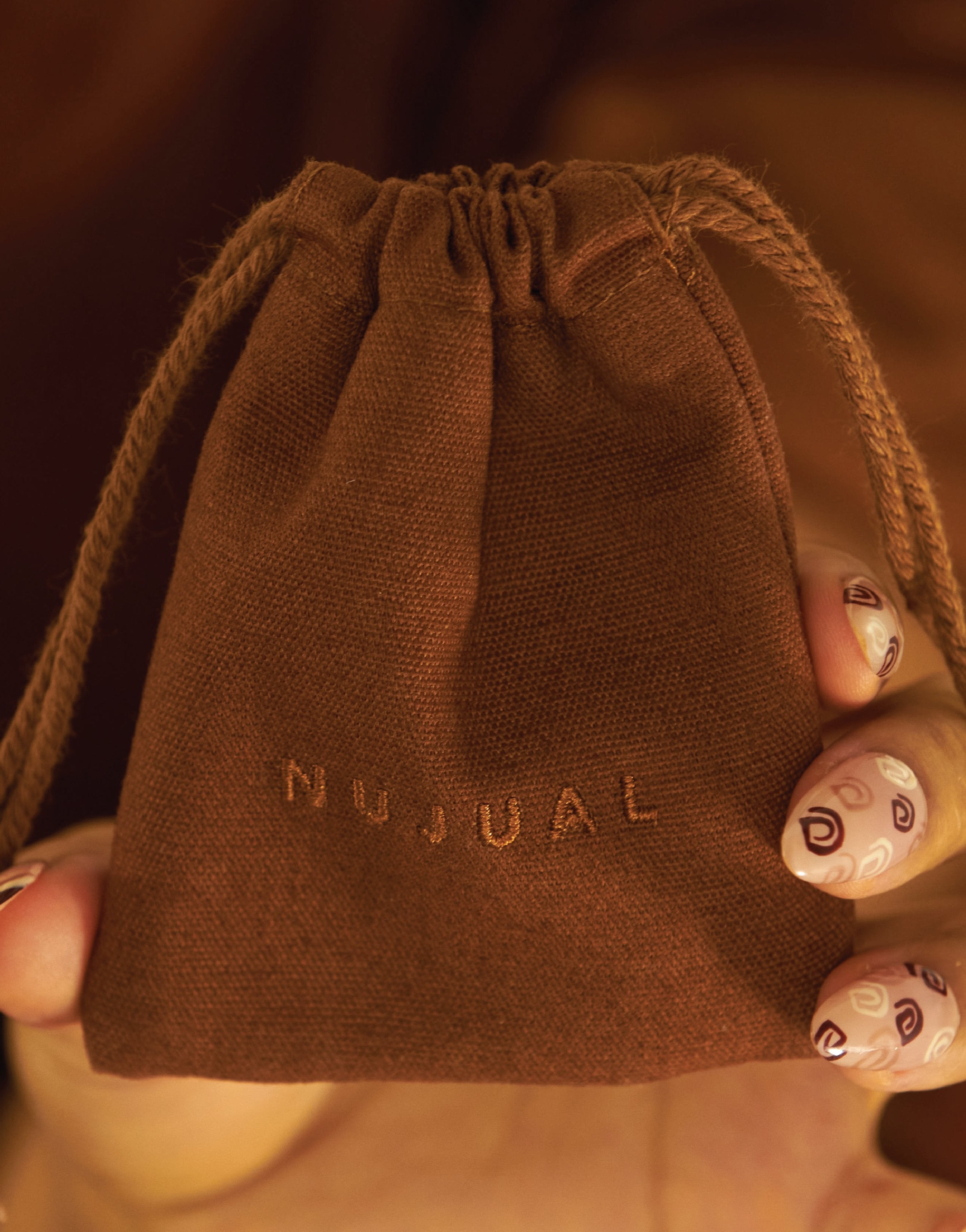 SURPRISE GIFT - NUJUAL, Inc.